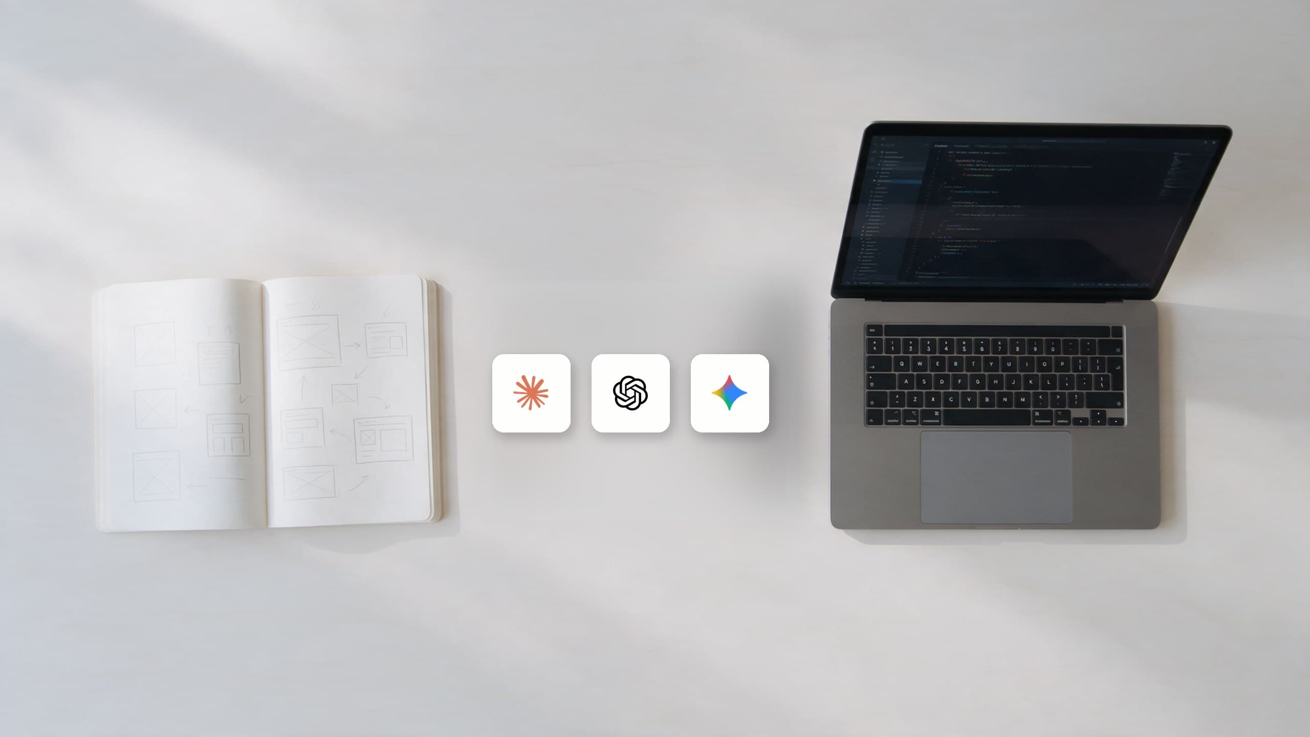 A desk with a notebook of hand-drawn wireframes on one side, a laptop showing code on the other, and the Claude, ChatGPT and Gemini app marks laid out between them